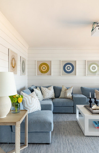 living-room-design-white-shiplap-walls-blue-sectional-sofa