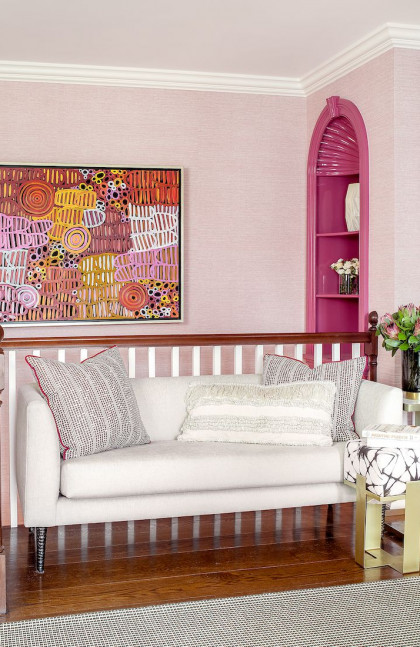 pink-interior-design-couch-patterned-area-rug